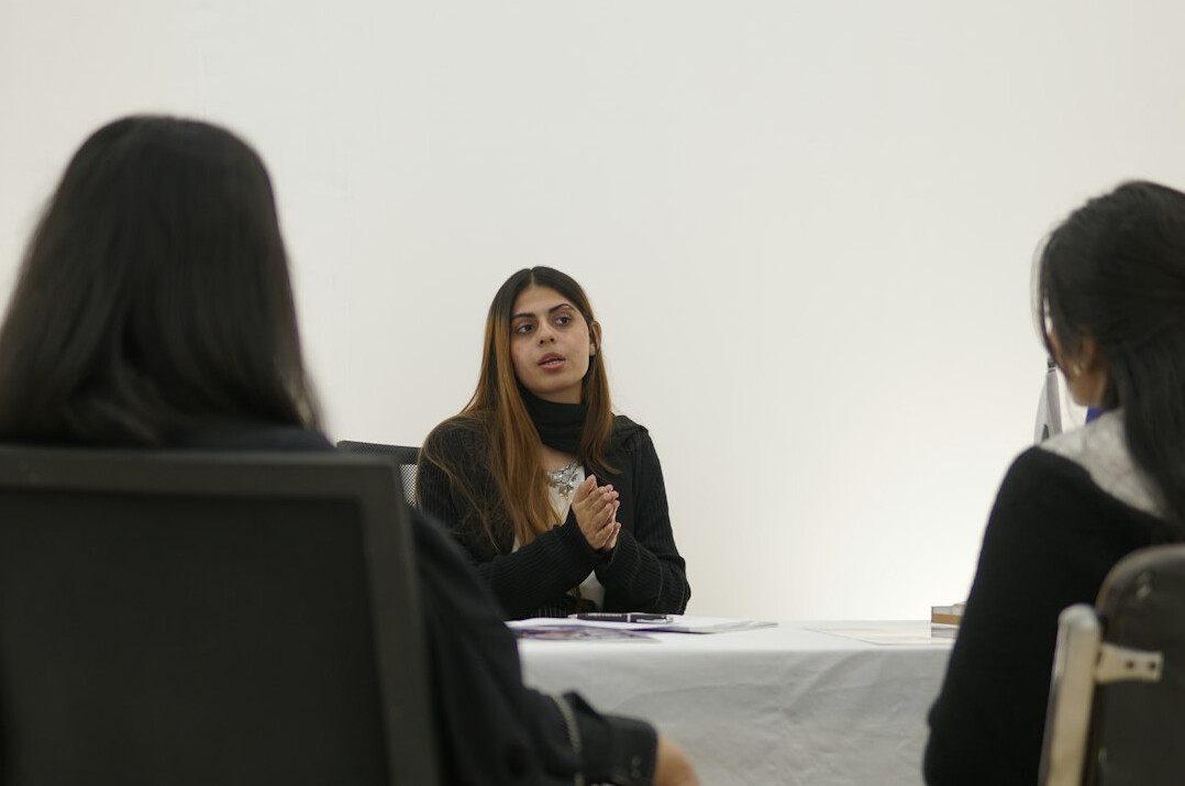 confident woman leading discussion