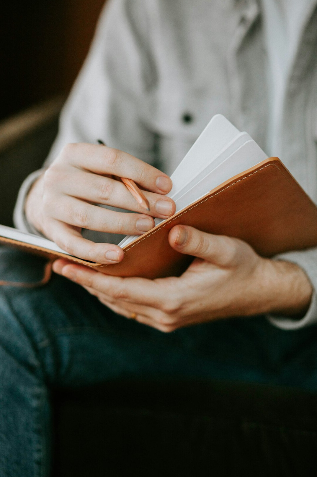 person journaling thoughts