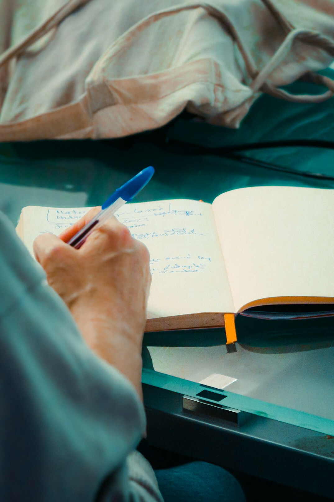 person writing notes